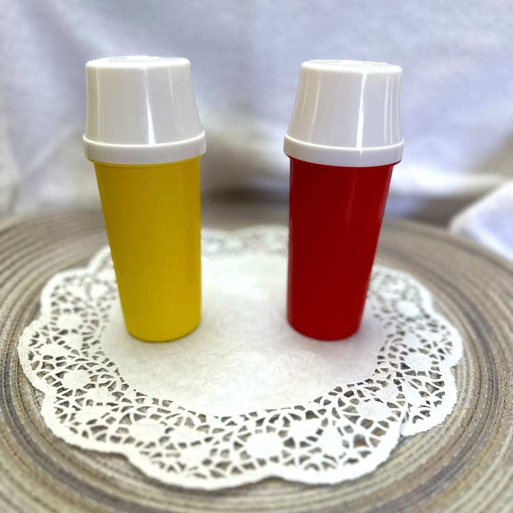 Tupperware ketchup/mustard pump containers